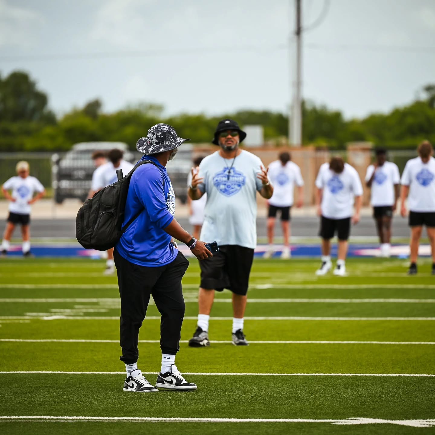 Coach Chris Taylor mentoring young football athletes during a Taylor Sports Performance athlete development and football training session in East Texas