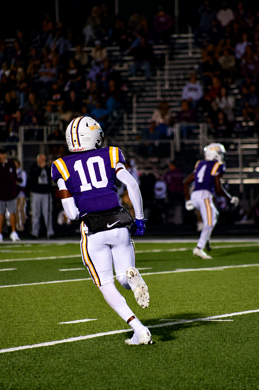 Donte Lott | No. 10 Buffalo Bison Football | Class of 2027 Donte Lott, Class of 2027 Buffalo High School football athlete, runs downfield in his purple No. 10 Bison jersey during a Friday night game in Buffalo, Texas.