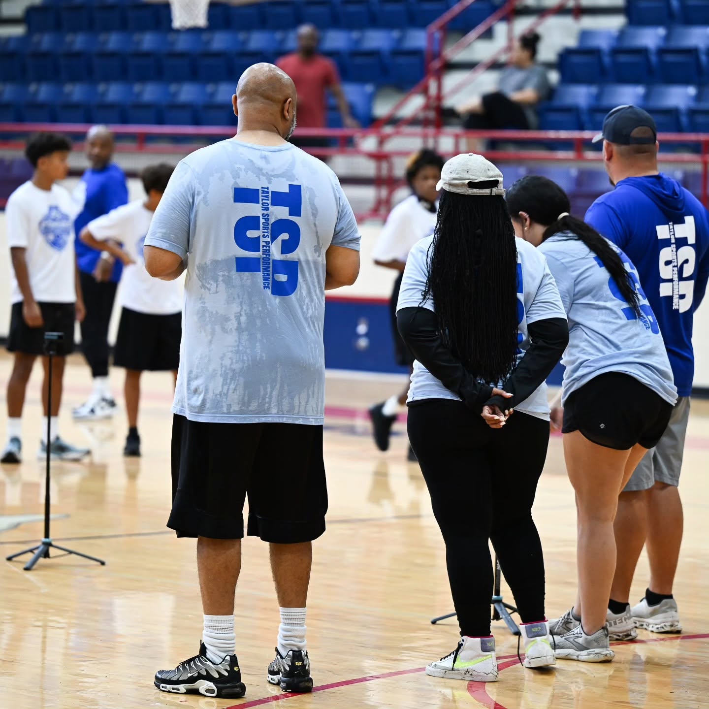 Taylor Sports Performance coaching staff mentoring young athletes during a TSP athlete development and football training session in East Texas